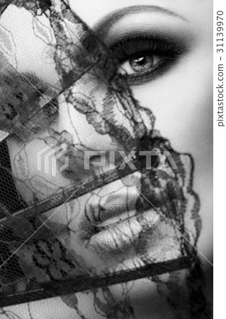 Closeup portrait of a mysterious woman Closeup portrait of a mysterious woman 31139970
