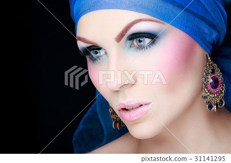 Beautiful woman in a lovely colorful makeup Beautiful woman in a lovely colorful makeup 31141295