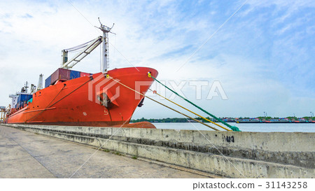 Cargo ship in the harbor with the river and sea Cargo ship in the harbor with the river and sea 31143258