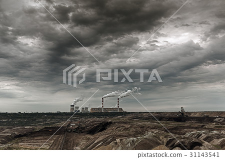 Storm clouds over open pit mine and power plant. Storm clouds over open pit mine and power plant. 31143541