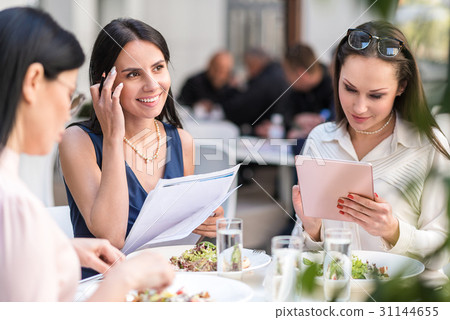 Outgoing females filling up form 31144655