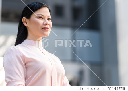 Calm woman look through distance Calm woman look through distance 31144756