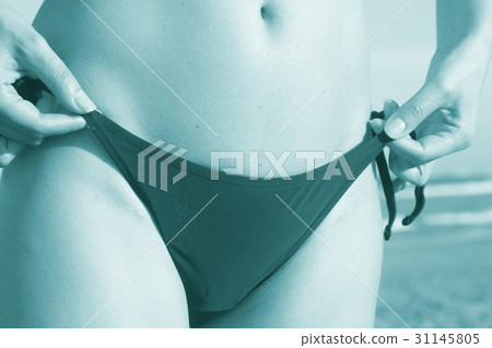 Young lady in bikini on beach 31145805
