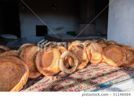 Traditional uzbek flatbread with sesame seeds Traditional uzbek flatbread with sesame seeds 31146084