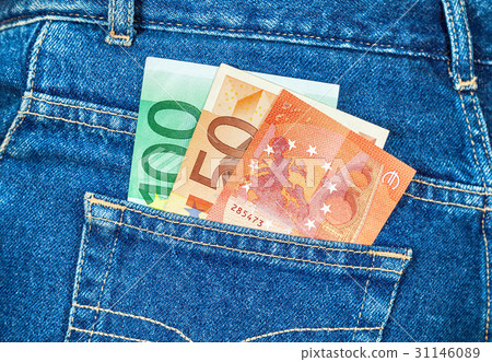 Euro banknotes sticking out of the jeans pocket Euro banknotes sticking out of the jeans pocket 31146089