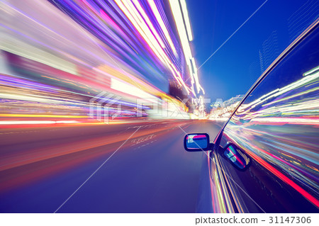 View from Side of Car moving in a night city View from Side of Car moving in a night city 31147306