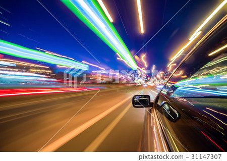 View from Side of Car moving in a night city 31147307