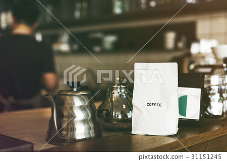 Coffee shop with objects on the wooden table Coffee shop with objects on the wooden table 31151245