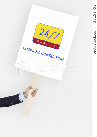 Hand holding a banner with 24/7 service 31151452
