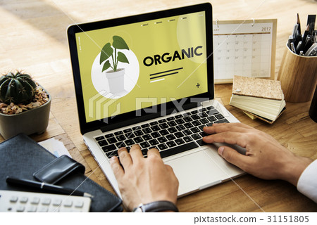 Hands on digital device with environmental graphic 31151805