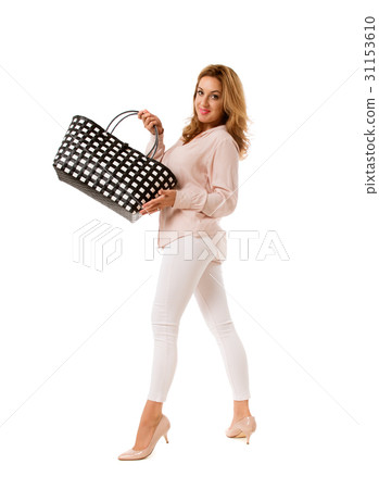 Pretty woman posing with bright tote bag.Isolated. 31153610