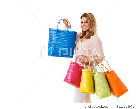 Beautiful woman with bright wicker tote bags.Isolated.Copyspace Beautiful woman with bright wicker tote bags.Isolated.Copyspace 31153643