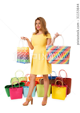 Beautiful  woman  with bright tote bags.Isolated. 31153644