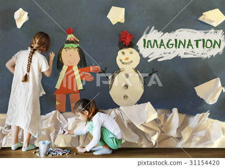 Children having fun with snowman artwork 31154420