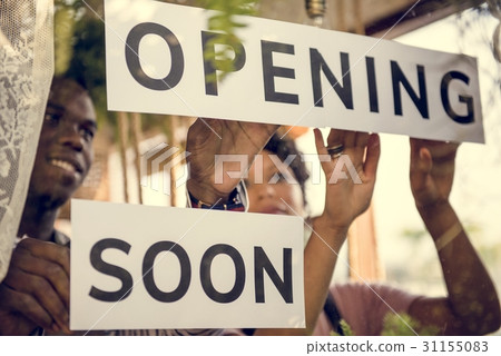 Couple Showing Opening Soon Paper Sign 31155083