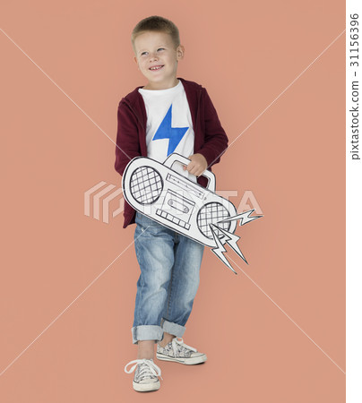 Portrait of a Little Blond Caucasian Boy with a Radio Isolated 31156396