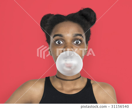 African Woman Blowing Bubble Gum Playful Portrait 31156540