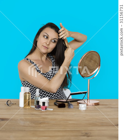 Elegance woman wearing makeup herself Elegance woman wearing makeup herself 31156731