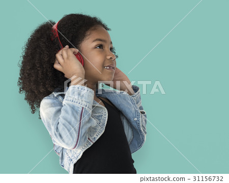 Little Girl Listening To Music Headphones Little Girl Listening To Music Headphones 31156732