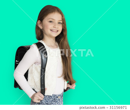Young freckled girl carrying a backpack smiling portrait 31156971
