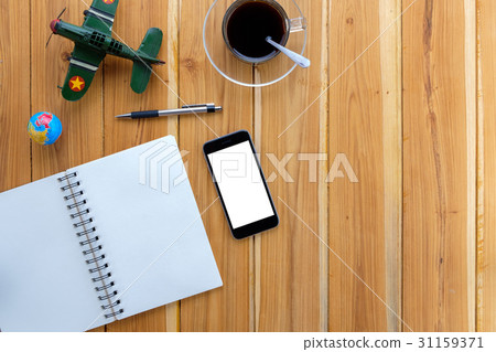 Office desk with blank screen smartphone 31159371