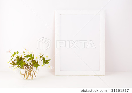 White frame mockup with Rue Anemone flowers White frame mockup with Rue Anemone flowers 31161817