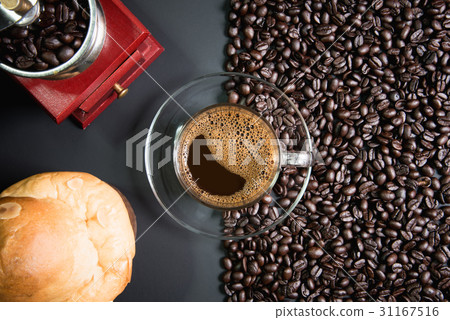 espresso in a glass on wooden table 31167516