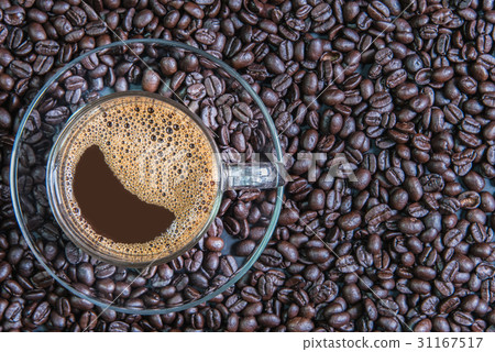 espresso in a glass on wooden table 31167517