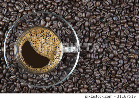 espresso in a glass on wooden table 31167519