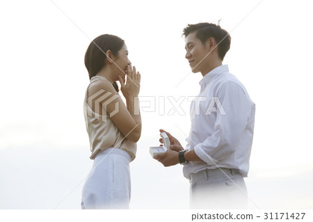 Proposal of a man is asking marry to his girlfriend. 31171427