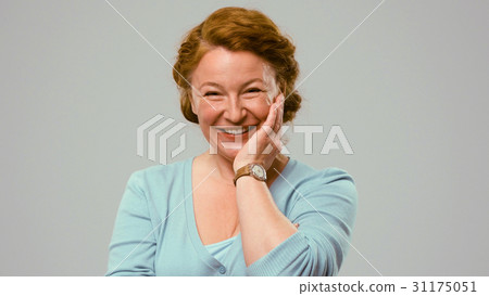 Mid aged actress showing emotions of affection. Mid aged actress showing emotions of affection. 31175051