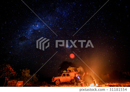 Camping with campfire and stars. 31181554