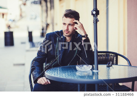 Fashionable man in a jacket Fashionable man in a jacket 31188466