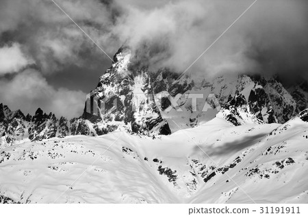 Black and white view on mount Ushba in fog 31191911