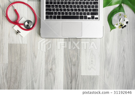 Doctor desk table with stethoscope. Doctor desk table with stethoscope. 31192646