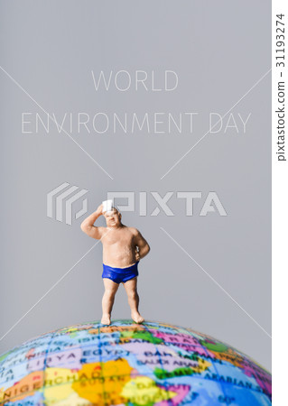 miniature man and text world environment day 31193274