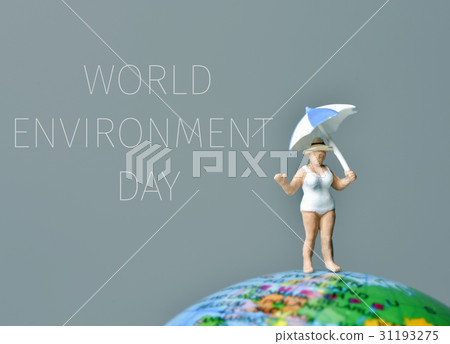miniature woman and text world environment day 31193275