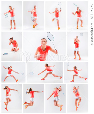 Young woman playing badminton over white 31193769