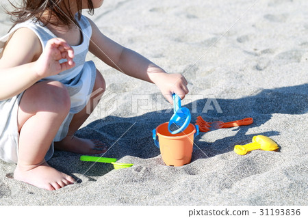Child (beach sea sunny sunny person face none beach sand playing leaving shovel shovel) Child (beach sea sunny sunny person face none beach sand playing leaving shovel shovel) 31193836