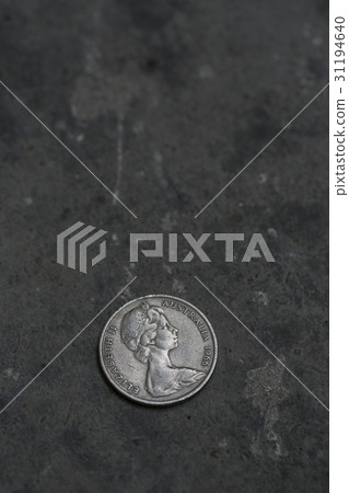 Australian 20 cents coin on the floor. Australian 20 cents coin on the floor. 31194640