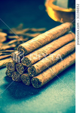 pile of authentic cuban cigars 31198852