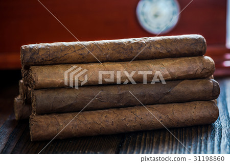 Cuban cigars and wooden humidor Cuban cigars and wooden humidor 31198860