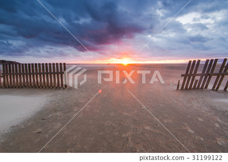 wind blowing sand on Tarifa beach in Spain  31199122