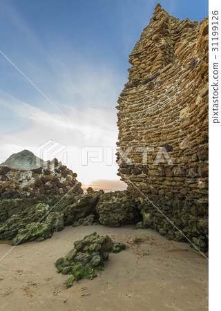 Torre del Loro Roman tower ruins on beach ,Spain Torre del Loro Roman tower ruins on beach ,Spain 31199126