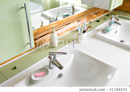 The bathroom in a rustic log cabin, in the The bathroom in a rustic log cabin, in the 31199233