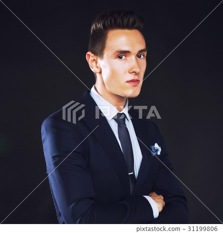young pretty business man standing on black young pretty business man standing on black 31199806
