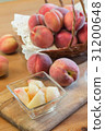 Served peaches 31200648