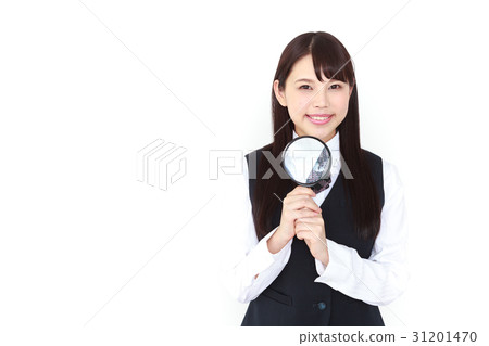 A young woman in a Sousse with a magnifying glass 31201470