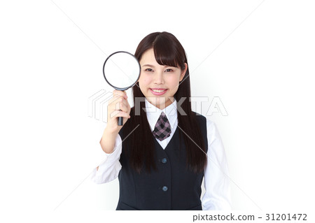 A young woman in a Sousse with a magnifying glass 31201472