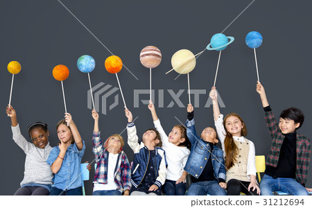 Happy Diverse group of kids holding planets Happy Diverse group of kids holding planets 31212694